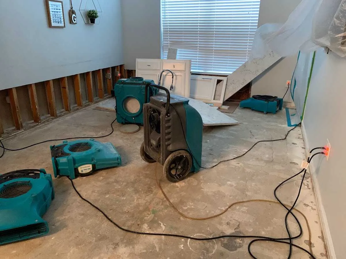 Dehumidifier in flood-cut room for Water Damage Restoration in Savage